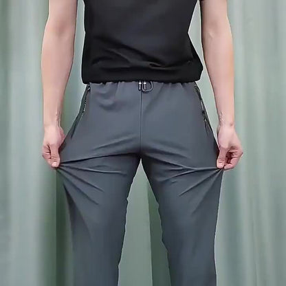 Three Pairs Of Men's Sport Pants. They Can Absorb Moisture And Wick Away Sweat, Keeping You Dry And Breathable. with Zipper Details, These Are Thin And Quick-drying Outdoor Pants, Which Are Perfect for Outdoor Sports And Home