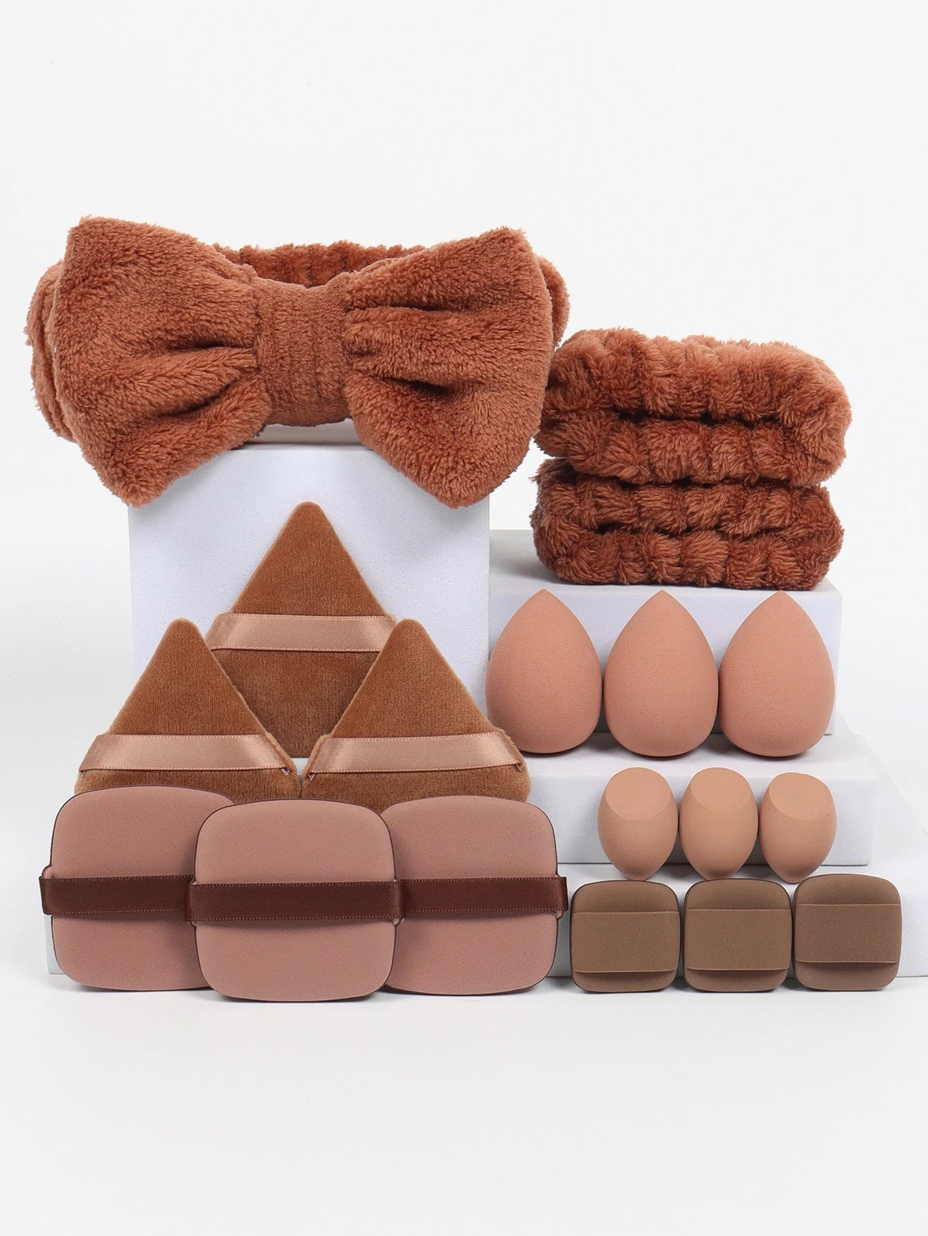 18 piece headband set. 1 hair band & 2 wrist bands & 3 make-up Sponges & 3 Mini Square Air Cushions & 3 triangular powder puff & Beauty World Shop