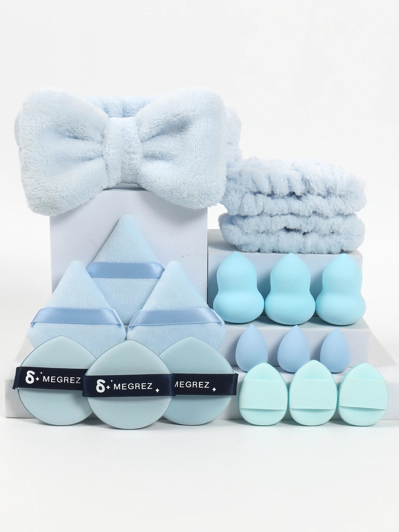 18 piece headband set. 1 hair band & 2 wrist bands & 3 make-up Sponges & 3 Mini Square Air Cushions & 3 triangular powder puff & Beauty World Shop