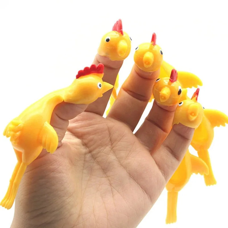 6-12pcs Novelty Catapulted Ejection Chicken Toy Light Rubber Finger Prank Flying Toy Slingshot Chicken Finger Toys Turkey Sticky Beauty World Shop