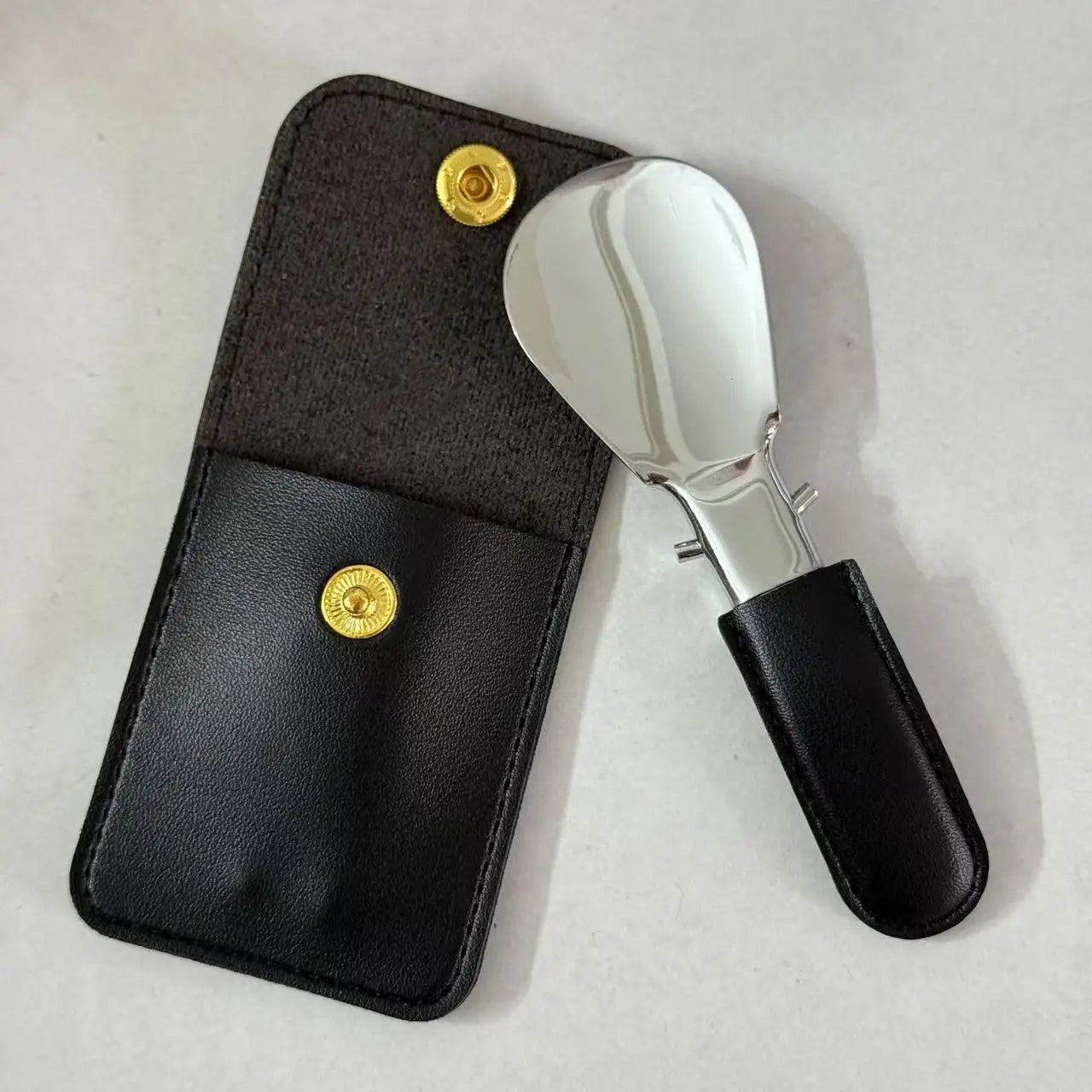 1 stainless steel shoehorn with leather bag, mini portable folding shoehorn, shoehorn for men and women. Beauty World Shop