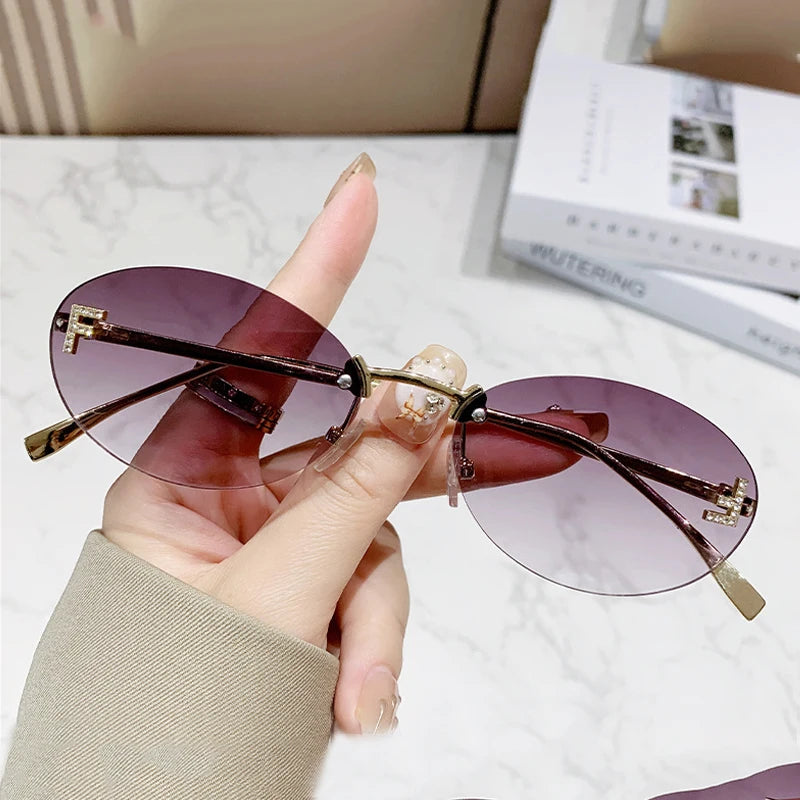 Fashion Rimless Sunglasses Women UV400 Oval Elegant Diamond F Sun Glasses Retro Eyewear Beauty World Shop