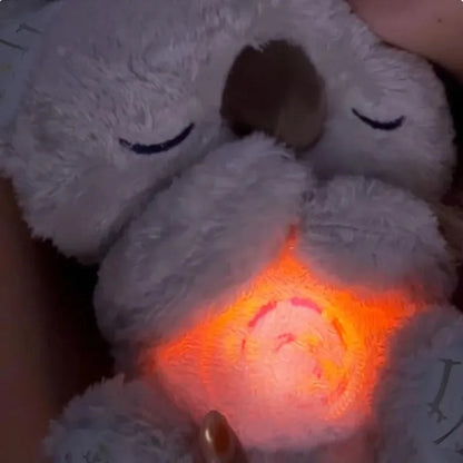 *Cuddly Koala Plush Sleep Aid with Soft Glow Night Light Calming Music and Simulated Breathing Comforting Bedtime Comfort Toys Beauty World Shop