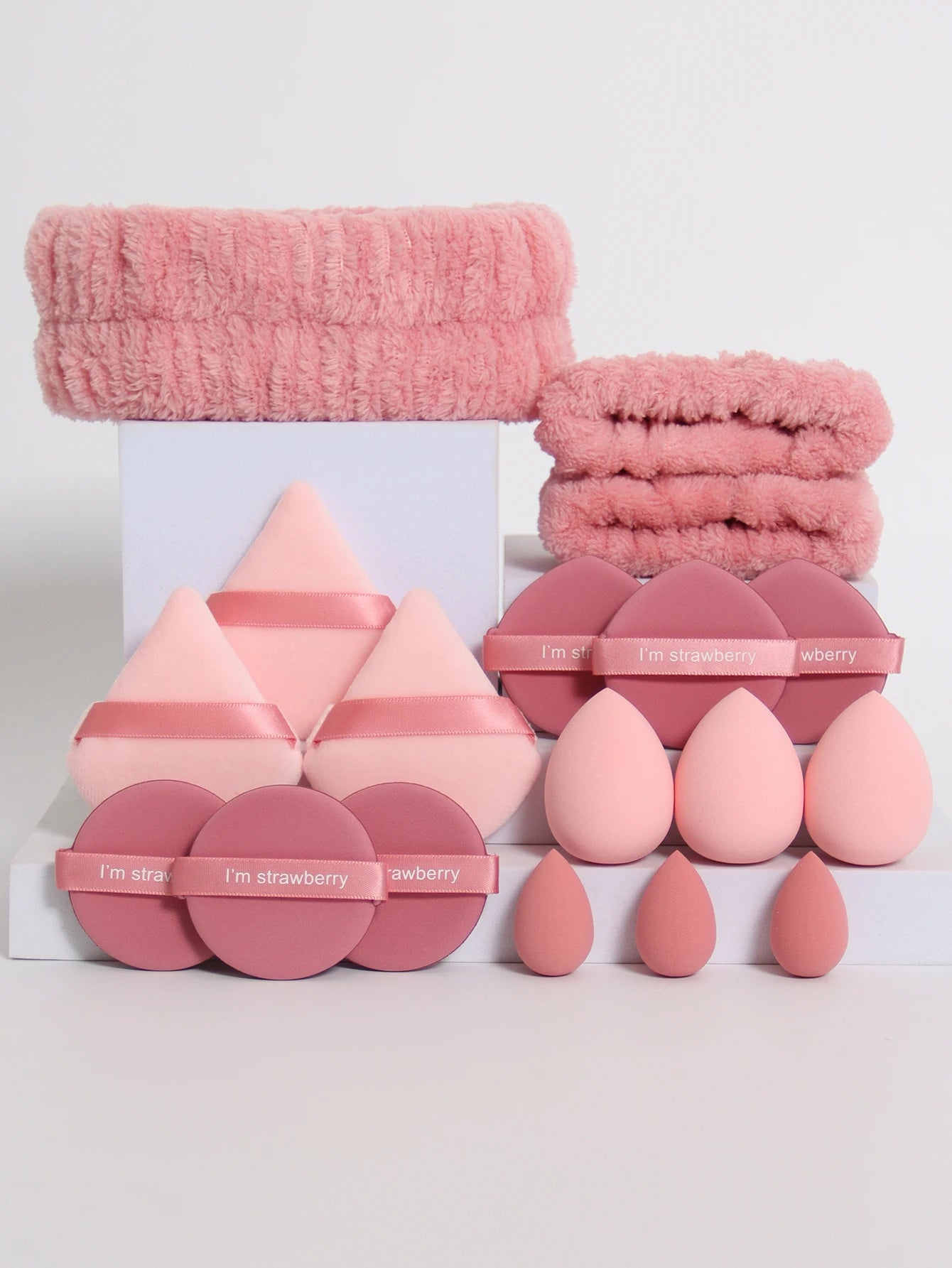 18 piece headband set. 1 hair band & 2 wrist bands & 3 make-up Sponges & 3 Mini Square Air Cushions & 3 triangular powder puff & Beauty World Shop