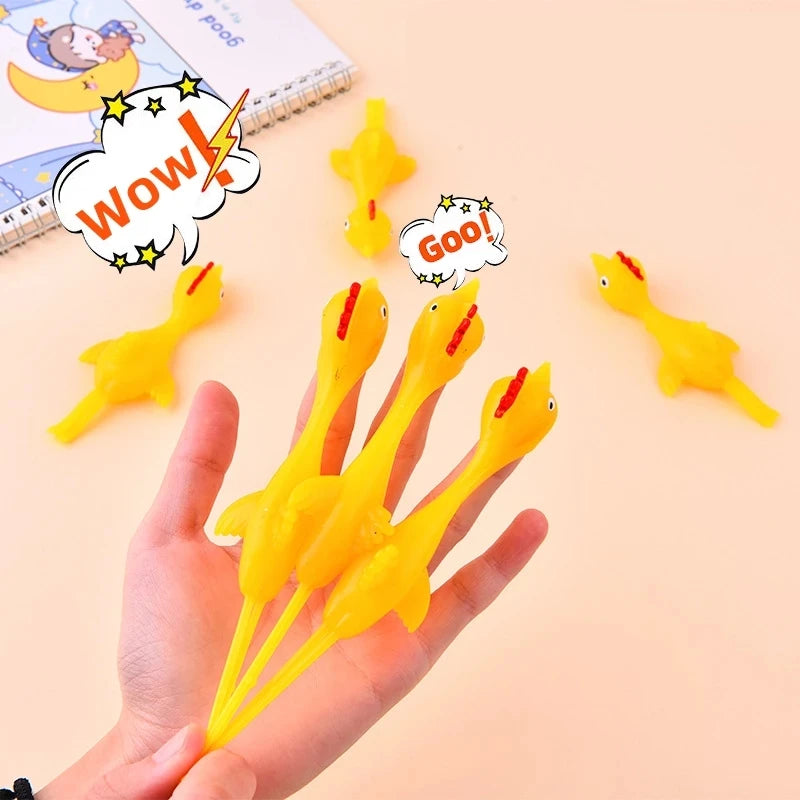 6-12pcs Novelty Catapulted Ejection Chicken Toy Light Rubber Finger Prank Flying Toy Slingshot Chicken Finger Toys Turkey Sticky Beauty World Shop