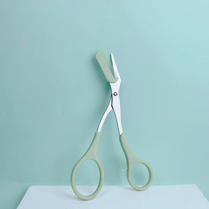 Pink eyebrow trimming scissors with built-in comb - stainless steel, precise grooming tool, creating perfect eyebrows Beauty World Shop