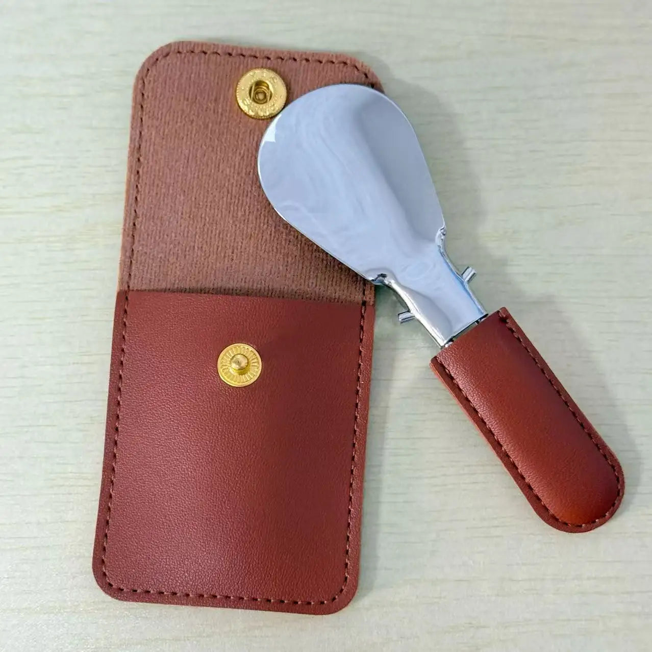 1 stainless steel shoehorn with leather bag, mini portable folding shoehorn, shoehorn for men and women. Beauty World Shop